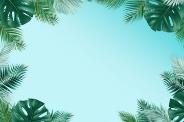Fototapeta na wymiar Tropical plants frame background with sky blue blank space for text on sky blue background, top view. Flat lay style. ,copy Space flat design