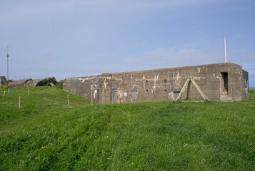 Granville, France - Apr 14, 2024: German battery built at Pointe du Roc during Second World War. Sunny spring day. Selective focus.