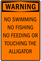 Beware of alligator sign no fishing, no swimming, no feeding or touching the alligator