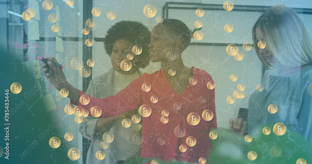 Poster image of bitcoin symbols over diverse business people having meeting at office