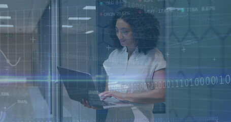 Image of financial data processing over businesswoman using computer
