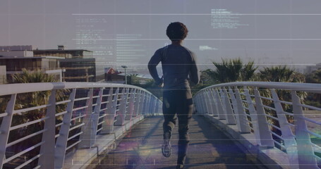 Image of computer language over rear view of african american man running on footbridge in city - Powered by Adobe