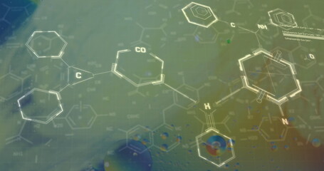 Image of chemical formula over bubbles on yellow background