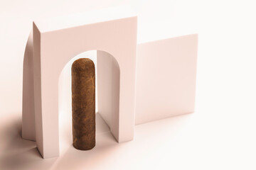 Cuban cigar presented in white arch. Elite smoking of rich people.