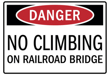 Railroad warning sign no climbing on railroad bridge