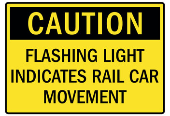 Railroad warning sign flashing light indicates rail car movement