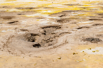 Hot geysers with sulfur and mud in the Stefanos crater on Nisyros island in Greece