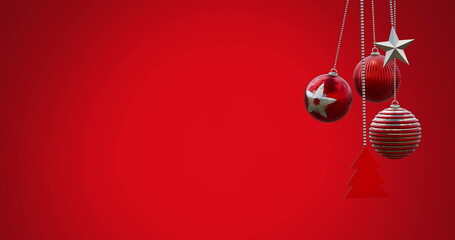 Image of hanging baubles, tree and star swinging against red background