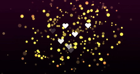 Image of heart shapes with circles floating against black background