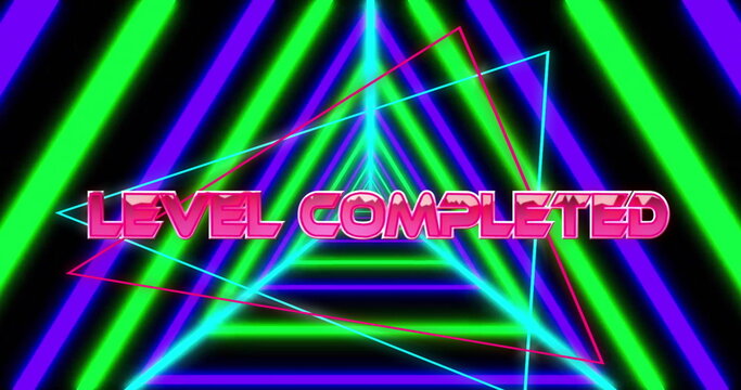 Image of level completed text over neon pattern