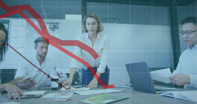 Image of red lines and data processing over diverse business people in office