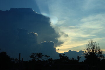 The phenomenon of rainbow clouds or Cloud iridescence or irisation that occurs in the afternoon in the sky in the region of Southeast Sulawesi, Indonesia
