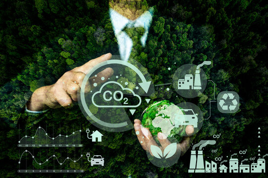 Concept of sustainability development by alternative energy,ESG,carbon natural,CO2 net zero.Double exposure graphic of business people  over  green renewable energy worker interface icon. 