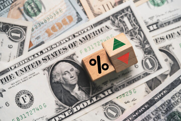 Percentage with green up and red down arrow on USD one dollar banknote for Federal bank reserve increase and decrease interest rate control which effect to America and world economic growth concept.