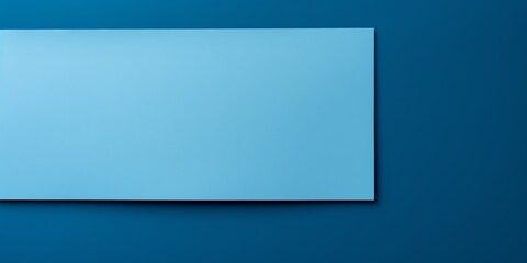 Sky Blue background with dark sky blue paper on the right side, minimalistic background, copy space concept