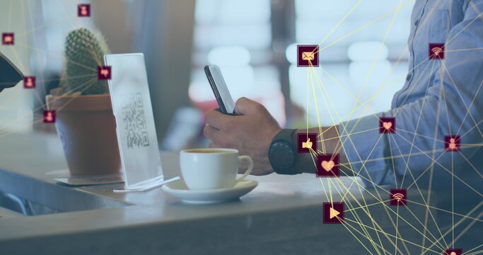 Image of network of connections with icons over caucasian man scanning qr code
