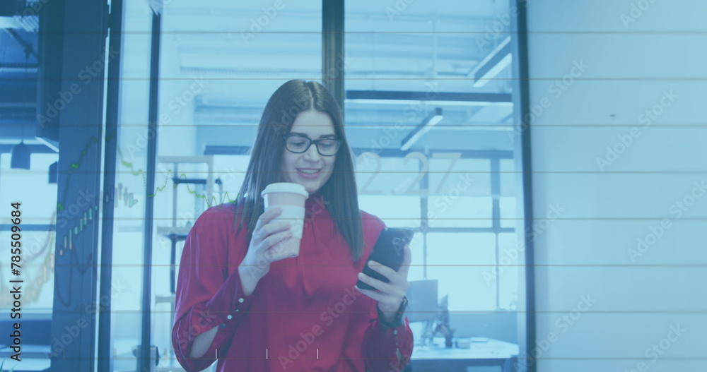 Poster Image of financial data over caucasian businesswoman with coffee and smartphone in office