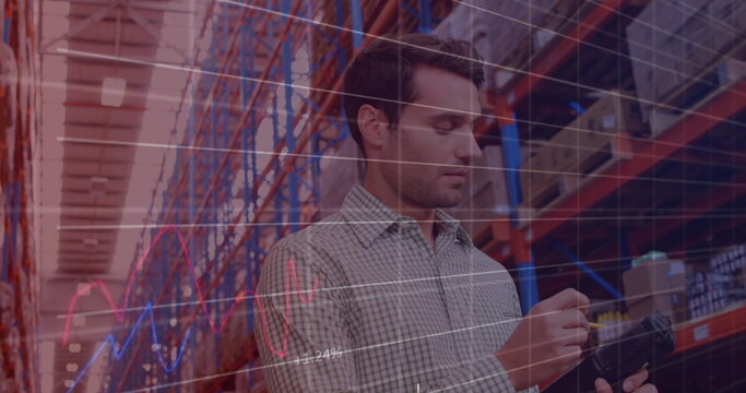Image of financial graphs over caucasian male warehouse worker