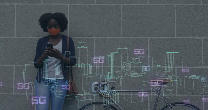 Image of graphical rotating skyscrapers and 5g text over african american woman using cellphone