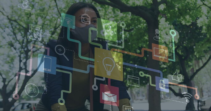 Image of colorful social media notifications and computer icons over woman riding bicycle