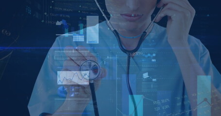 Image of data processing over mid section of female caucasian doctor holding stethoscope - Powered by Adobe