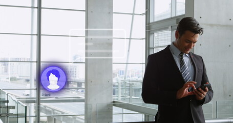 Image of media icon over caucasian businessman using smartphone