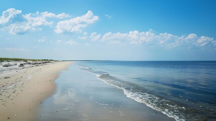 Obraz premium Soft-focused view of a deserted coastal area, showcasing calm waters and a serene beach scene 01