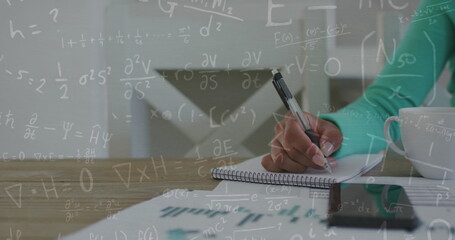 Image of biracial girl writing and mathematical drawings - Powered by Adobe