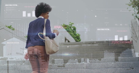 Image of interface with data processing over african american businesswoman climbing stairs
