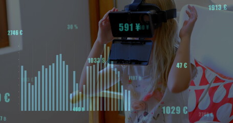 Image of financial data processing over caucasian girl using vr headset