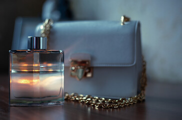 Perfume and women's bag. stylish accessories