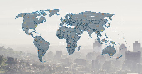 Fototapeta premium Image of world map and financial data processing over cityscape