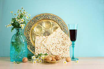 Pesah celebration concept (jewish Passover holiday). Translation of Traditional pesakh plate text: Passover, shankbone, bitter hearb, sweet date - obrazy, fototapety, plakaty