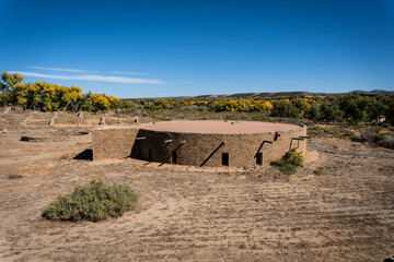 Great Kiva at Aztec Ruins National Monument in New Mexico. Best preserved Chacoan structures including Aztec West great house built by ancestral Pueblo people. Reconstructed kiva, religious site.