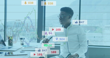 Image of notification bars and graphs over thoughtful african american man sitting in office