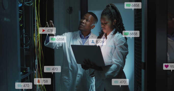 Image of notification bars over diverse engineers discussing on laptop in server room