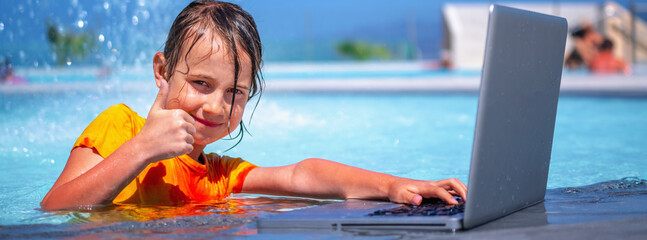 Conceptual image of distance learning. Portrait of young beautiful happy girl learning with laptop computer in the swimming pool.