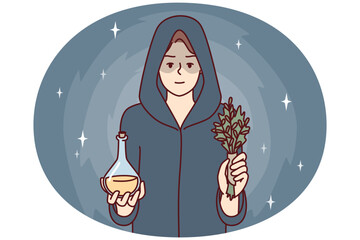 Woman sorceress dressed in cloak with hood holds miraculous elixir and sprig of plant. Healer girl prepared for mysterious rite using magic or healing conspiracy