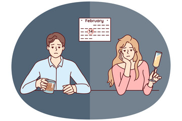 Man and woman celebrate February 14 alone due to absence of second half. Unhappy guy and girl are sad sitting at table because of separation on Valentine Day - 785550238