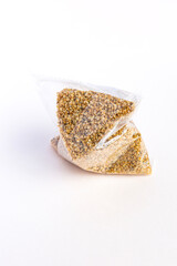 Dry food Daphnia for aquarium fish feed bag, package on White background