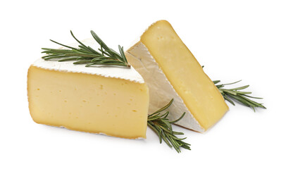 Pieces of tasty camembert cheese and rosemary isolated on white