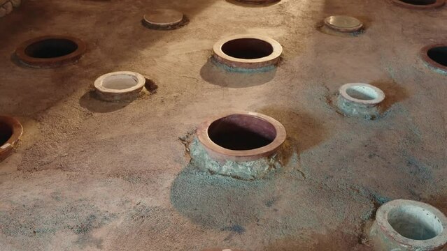 View of underground cellar for storing georgian wine in kvevri