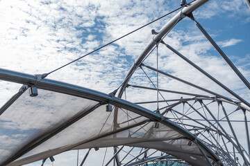 Close-up detail of Helix Bridge, or The Helix, a pedestrian bridge linking Marina Centre with...