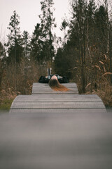 girl lying on the road for bicycles