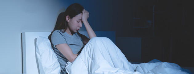Sad worried and stressed, depressed asian young woman, girl suffering in bed from insomnia problem,...