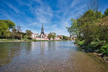 Ulm Minster (steeple measuring 161.53 meters) seen from the banks of the Danube (Germany)