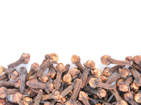 Cloves on white background