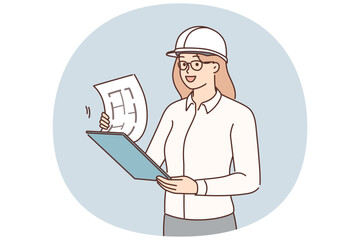 Female engineer with blueprint at site