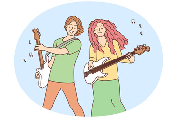 Happy musicians playing on guitars