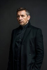 Fototapeta premium Man in black suit and tie